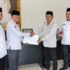 Modernisasi Aset Keagamaan, Kakan Kemenag Buol Serahkan Blangko e-AIW dan Pantau Aplikasi SIWAK di KUA Paleleh