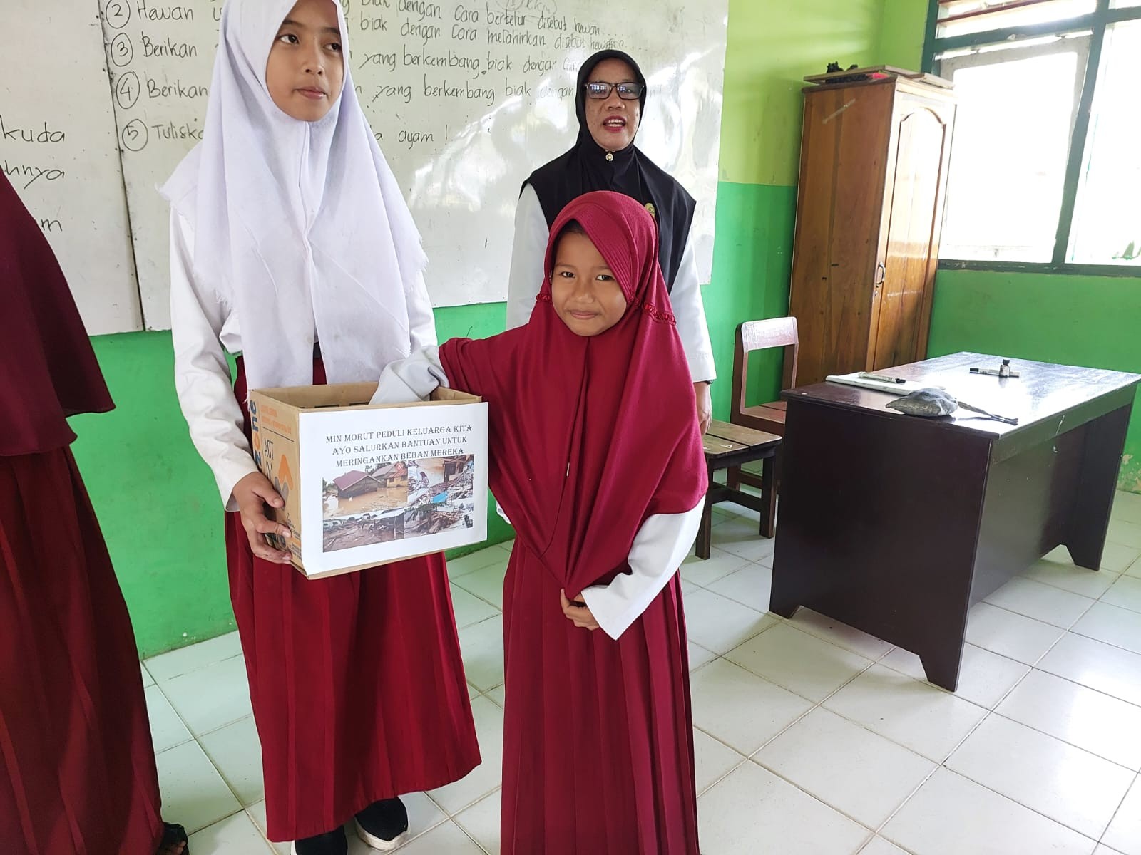 MIN Morowali Utara Peduli Korban Banjir Bandang Desa Torue Kab. Parimo